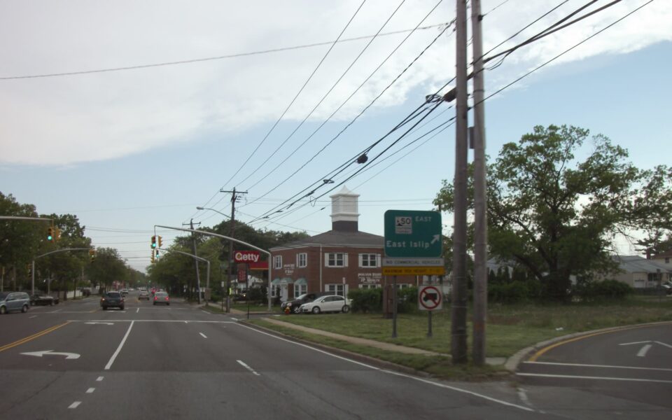 Downtown area of Massapequa, New York showing road to East Islip.