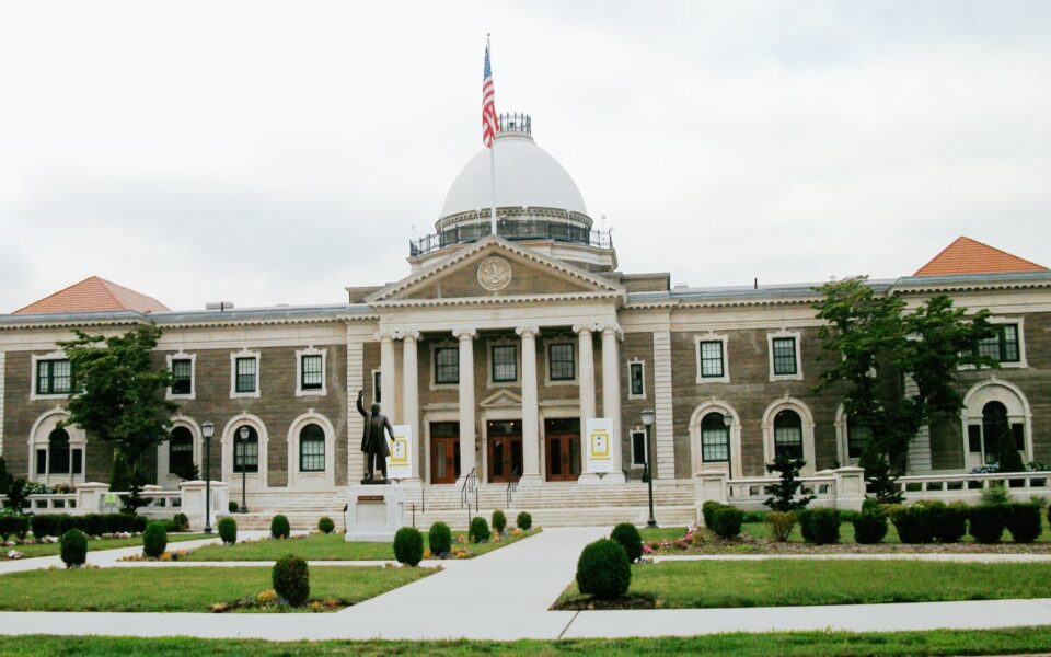 Front facing photo of the Old Nassau County Courthouse in New York.