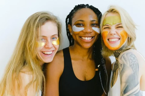 three women smiling spa